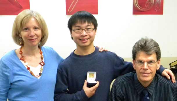 Theory Student Eric Tan with His National Gold Medal in Music Theory with his teachers Lynn & Peter Ware